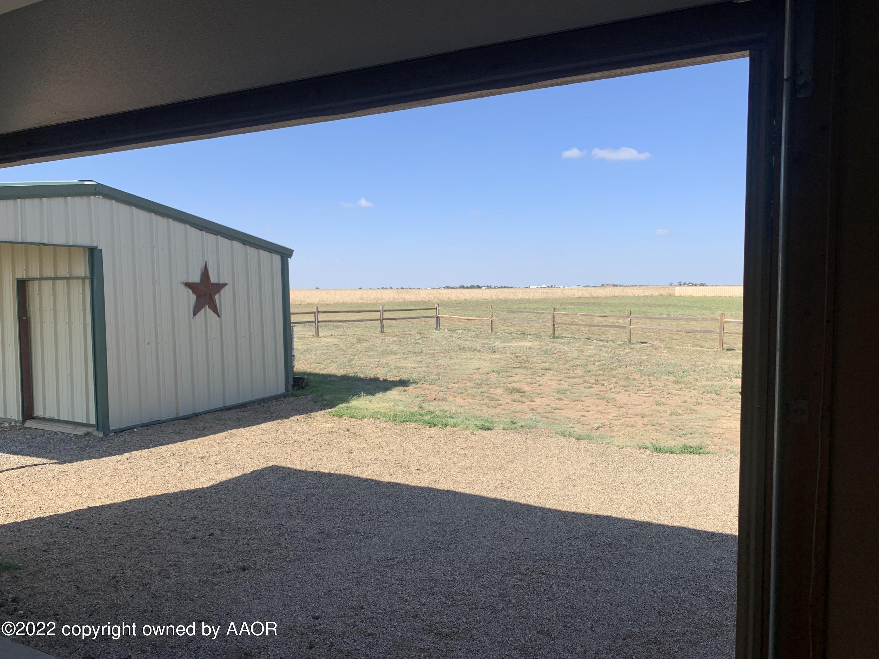 12720 Bobcat Road Amarillo, TX 79118 - Photo 32 of 35 View out of the Garage