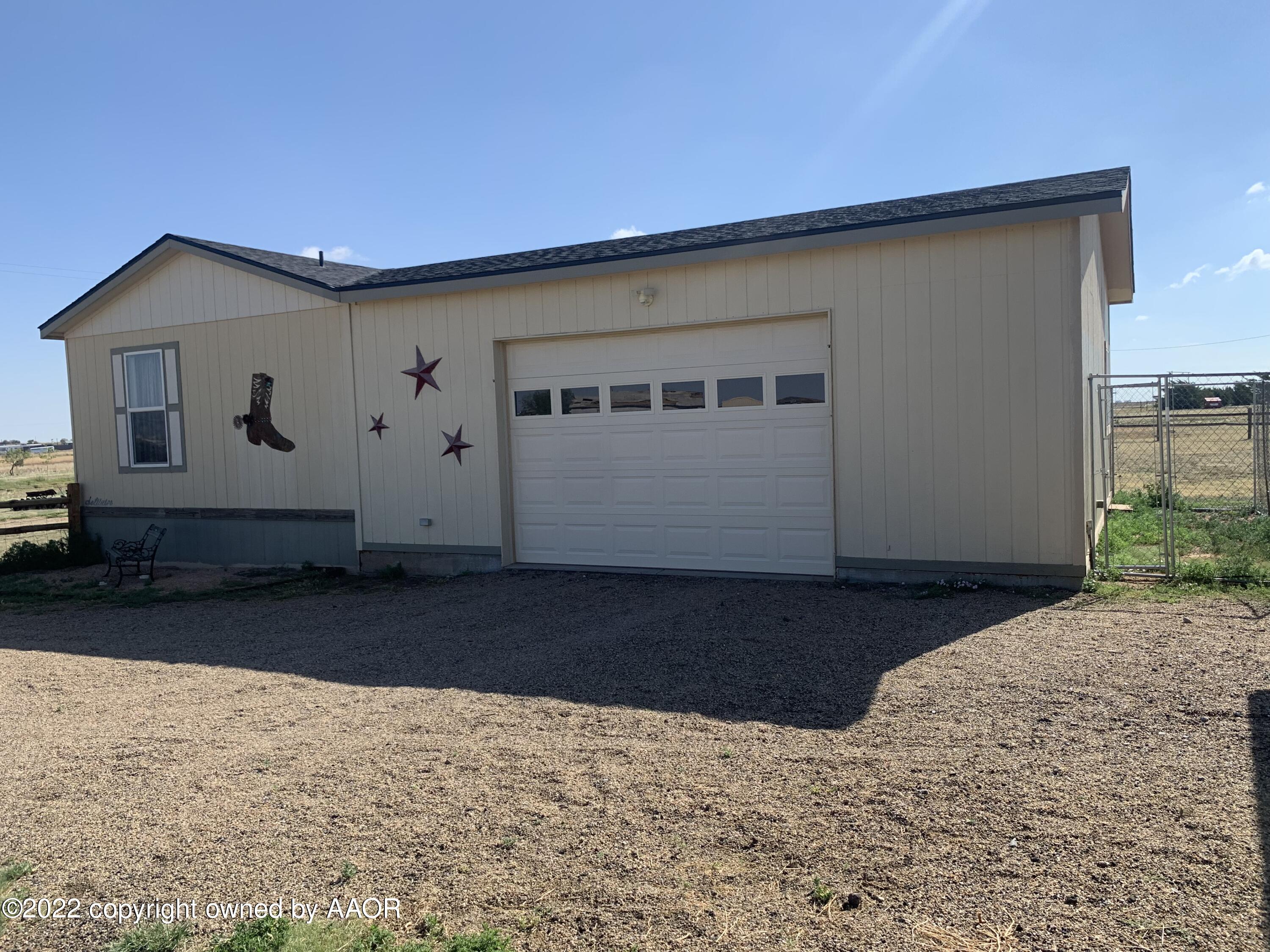 12720 Bobcat Road Amarillo, TX 79118 - Photo 6 of 35 Sideview w/ Garage #2
