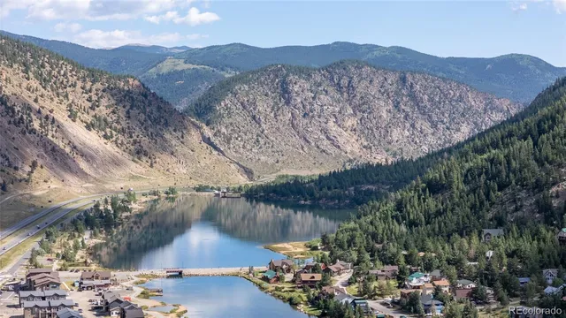 a view of a lake with mountain