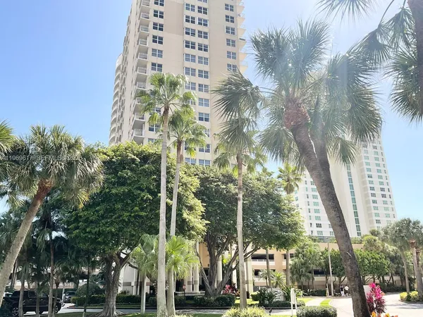 a view of a city with tall buildings