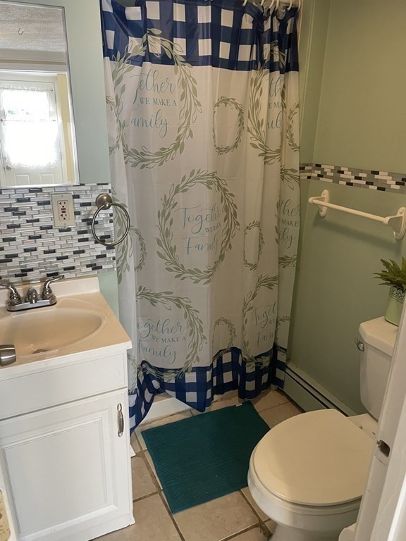 20 Johnson Street Ashland, MA 01721 - Photo 11 of 24 a bathroom with a toilet and a sink