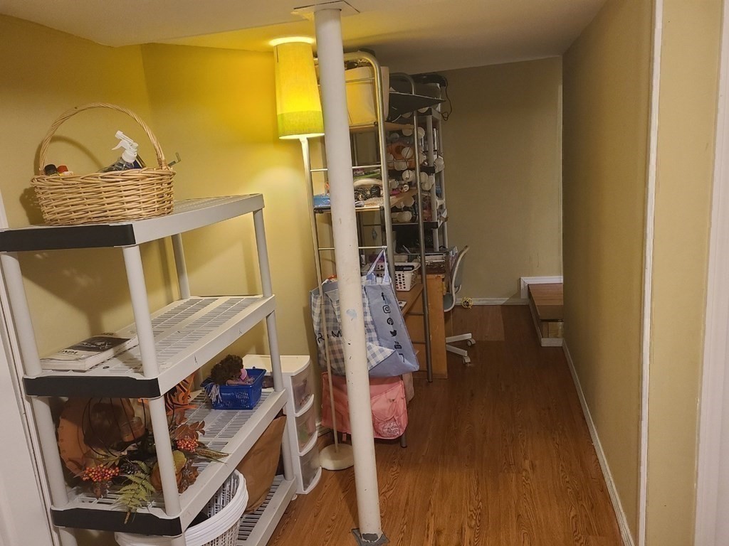 20 Johnson Street Ashland, MA 01721 - Photo 13 of 24 a view of walk in closet with clothes and shoes