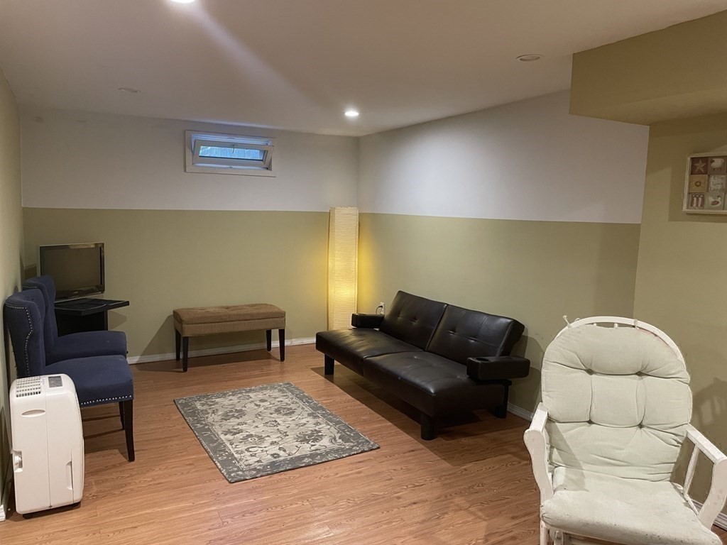 20 Johnson Street Ashland, MA 01721 - Photo 15 of 24 a living room with furniture and a couch