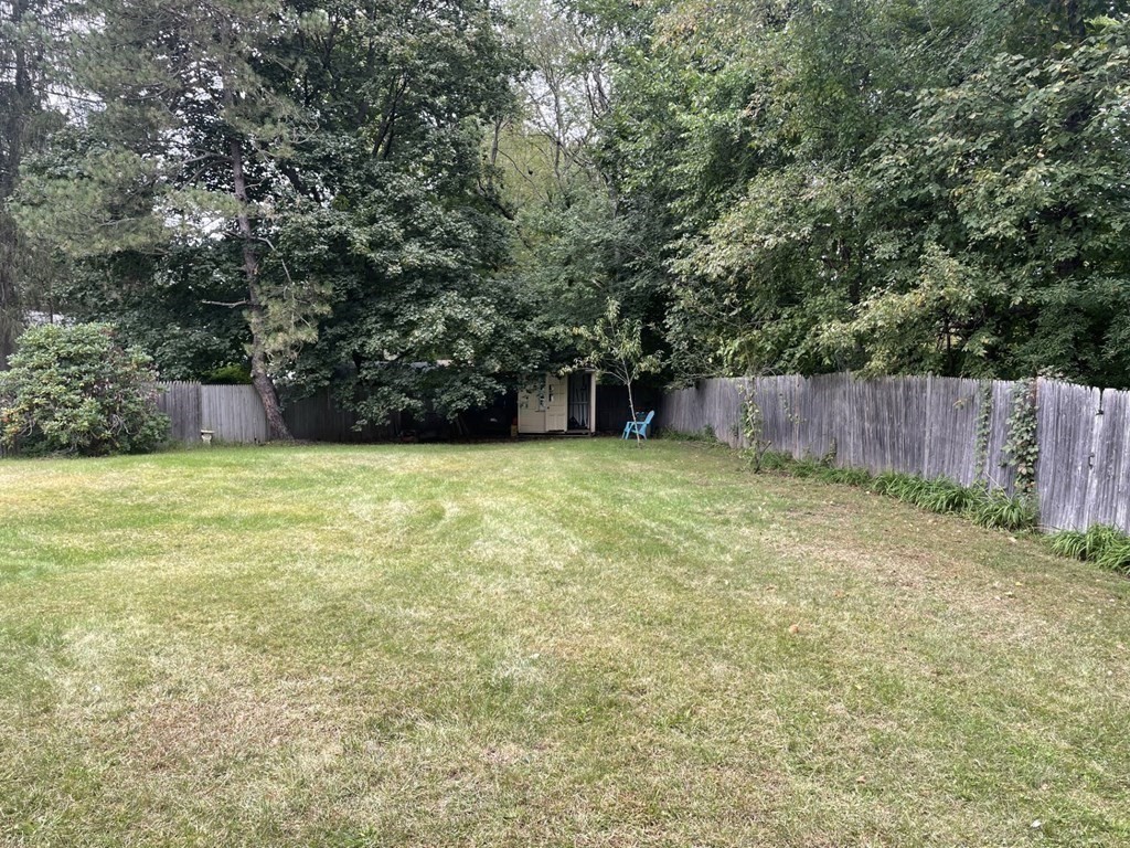 20 Johnson Street Ashland, MA 01721 - Photo 19 of 24 a view of a backyard with large trees