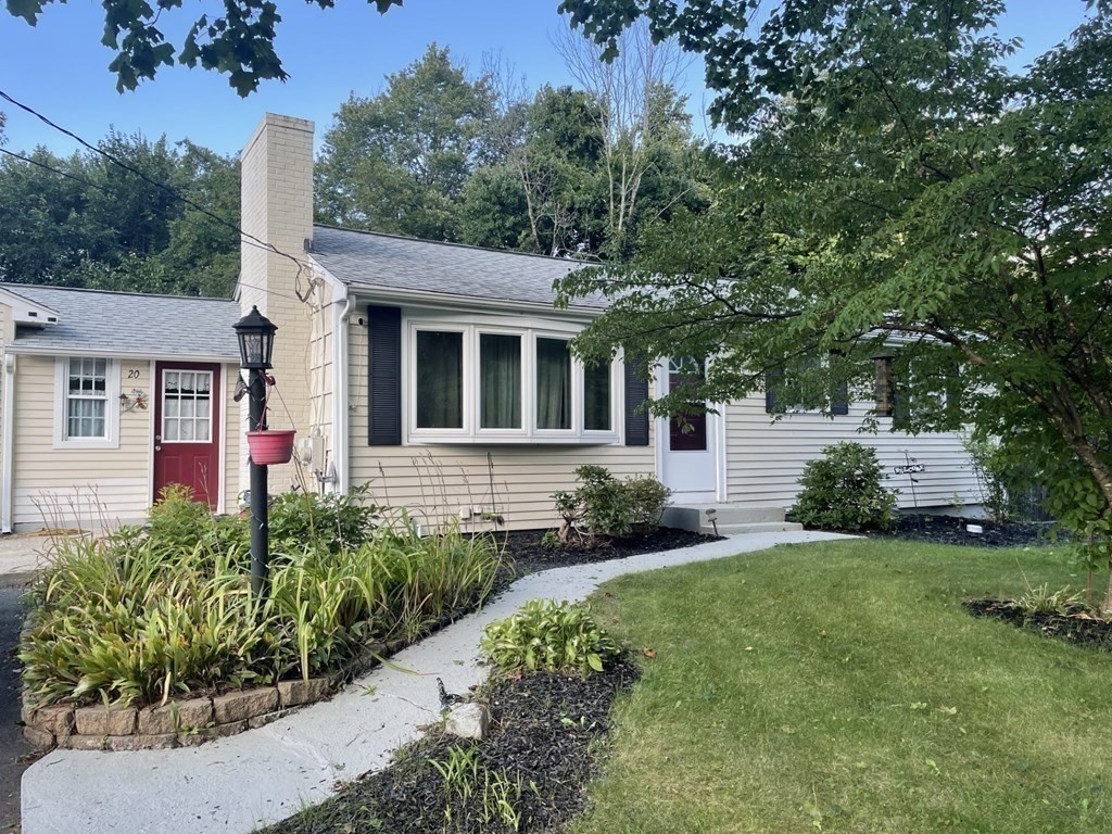 20 Johnson Street Ashland, MA 01721 - Photo 20 of 24 a front view of a house with garden