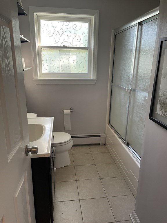 20 Johnson Street Ashland, MA 01721 - Photo 10 of 24 a bathroom with a granite countertop sink toilet and shower