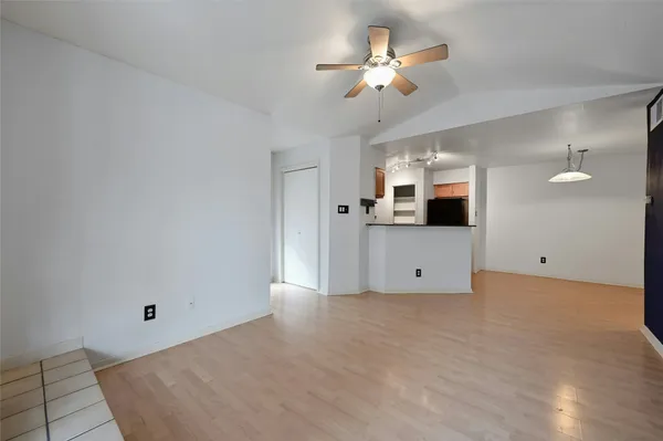 a view of a kitchen with microwave and a stove