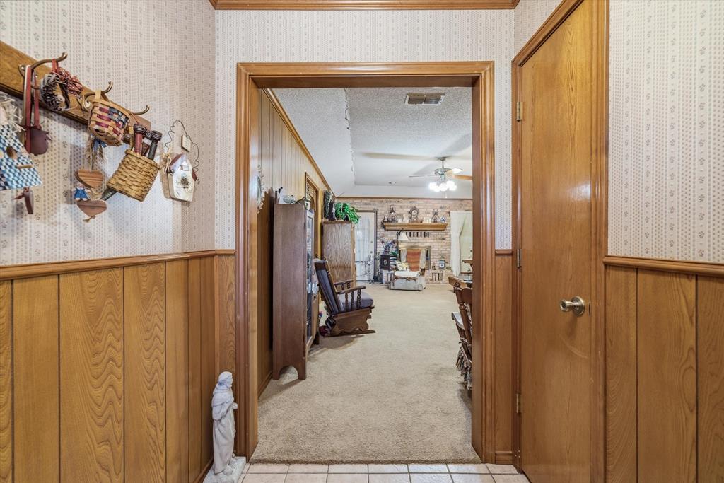 122 Bull Durham Road Wills Point, TX 75169 - Photo 3 of 33 a view of a hallway with closet and a white door