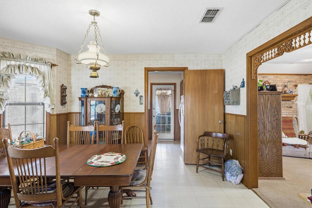 122 Bull Durham Road Wills Point, TX 75169 - Photo 10 of 33 a view of a dining room with furniture