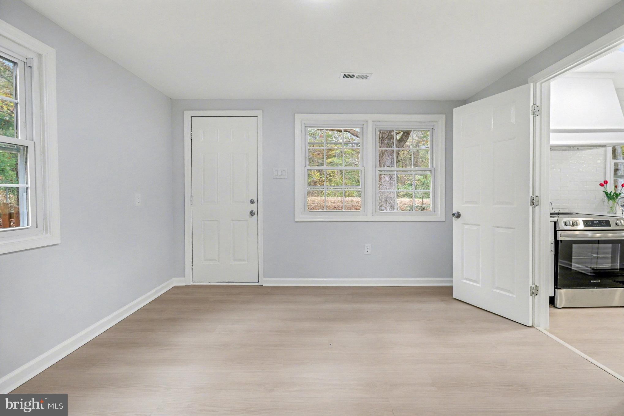 846 Borden Road Bumpass, VA 23024 - Photo 16 of 32 an empty room with windows