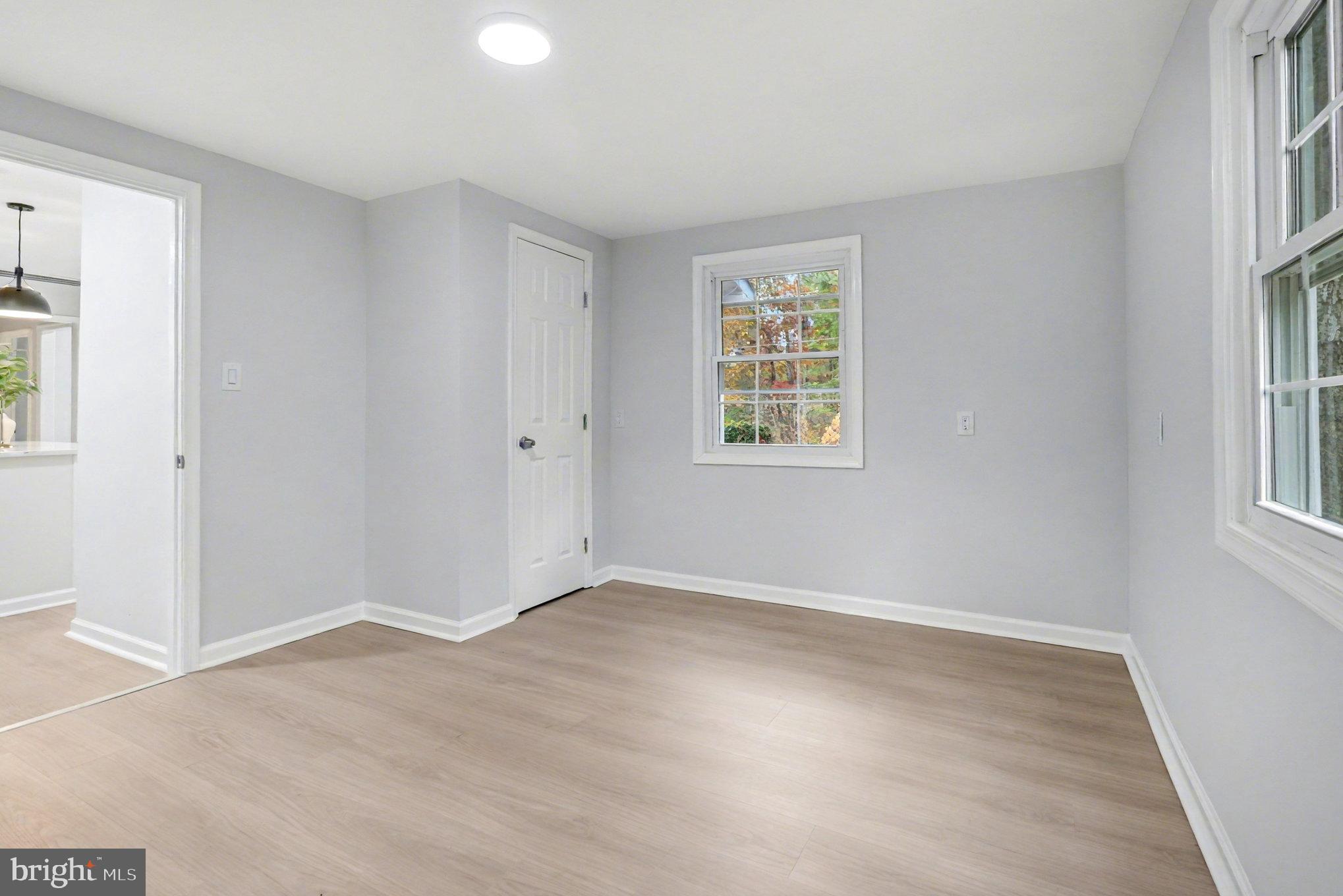 846 Borden Road Bumpass, VA 23024 - Photo 17 of 32 an empty room with windows