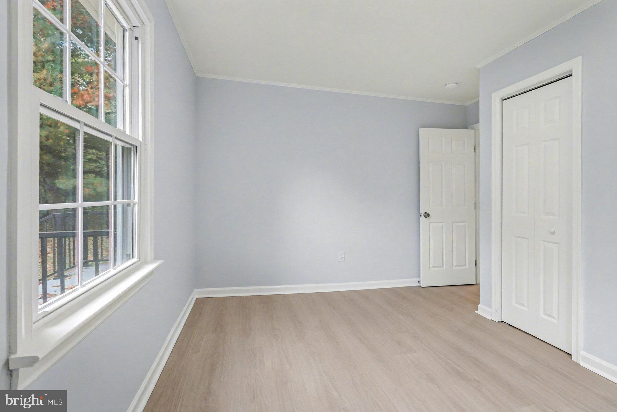 846 Borden Road Bumpass, VA 23024 - Photo 23 of 32 an empty room with a window