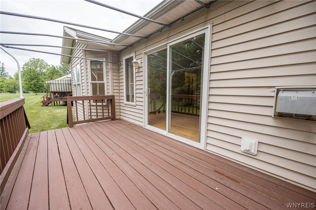 5 Alexander Parkway Pendleton, NY 14120 - Photo 44 of 49 Back porch has the framework for an awning.