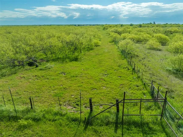 a view of a yard with an outdoor space