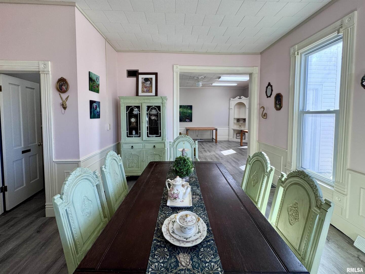 1415 4th Street Fulton, IL 61252 - Photo 14 of 58 a living room with furniture chandelier and a wooden floor