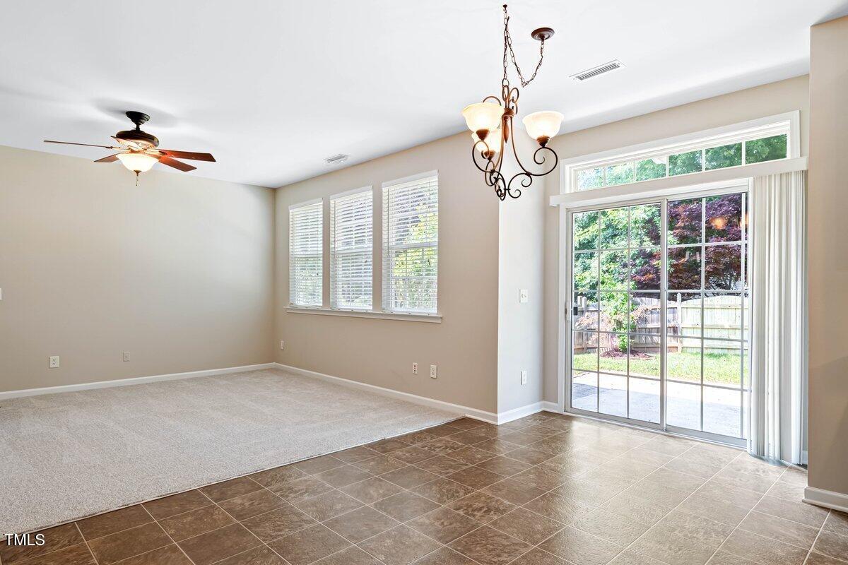120 Ryder Cup Circle Raleigh, NC 27603 - Photo 4 of 18 a view of an empty room with a window