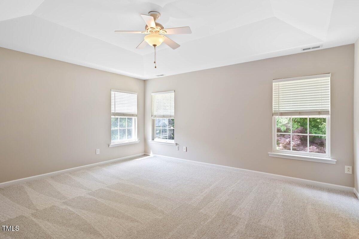 120 Ryder Cup Circle Raleigh, NC 27603 - Photo 8 of 18 a view of an empty room with a window
