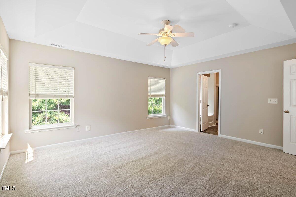 120 Ryder Cup Circle Raleigh, NC 27603 - Photo 9 of 18 a view of an empty room with a window