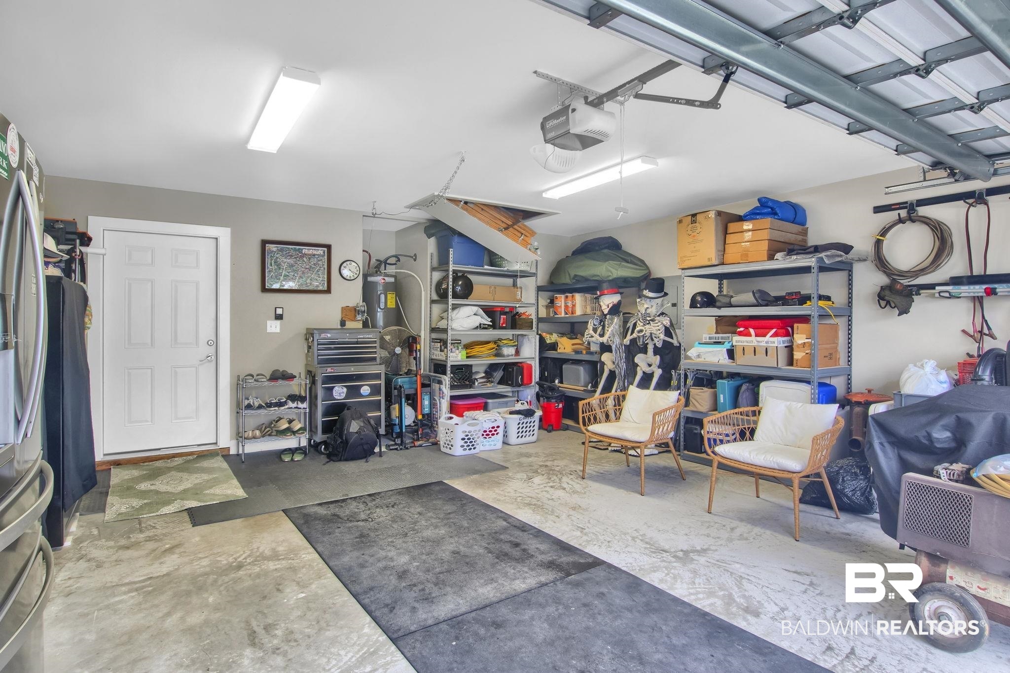 203 Lakefront Circle Summerdale, AL 36580 - Photo 51 of 69 Garage featuring a garage door opener