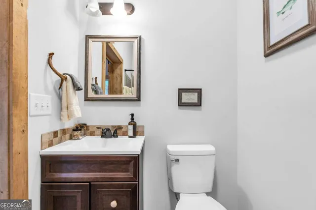 a view of a balcony with chairs