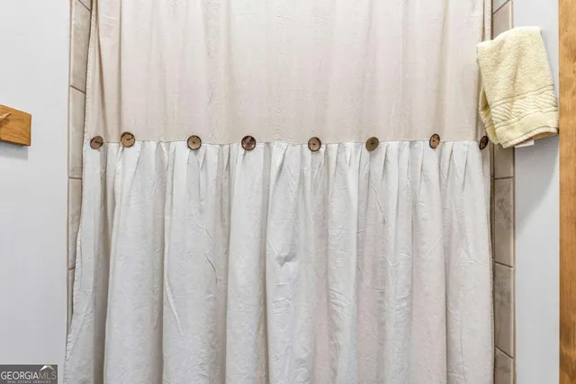 a view of balcony with wooden floor