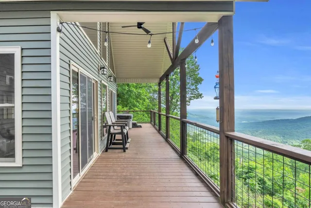 a view of a balcony with an outdoor space
