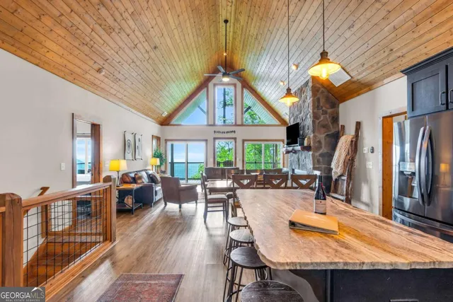 a living room with furniture fireplace and a flat screen tv