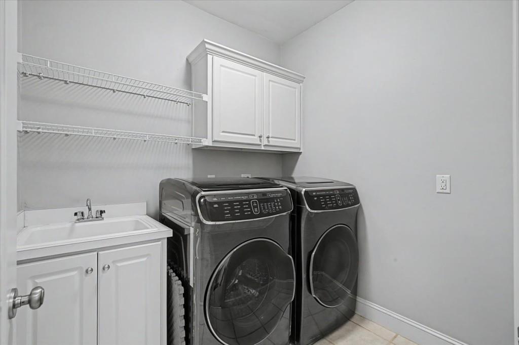 122 Ridge View Drive Ball Ground, GA 30107 - Photo 34 of 84 a utility room with dryer and washer