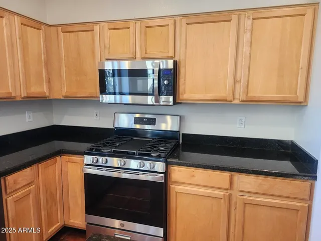 a big room with closet and windows