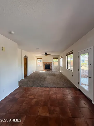 a large kitchen with a large counter top and appliances