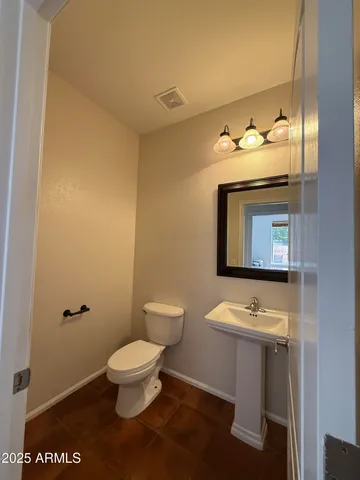 a utility room with closet dryer and washer