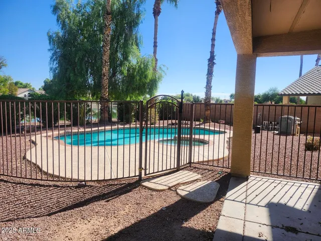a view of a porch with furniture and a window