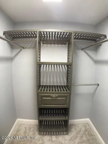 a bathroom with a sink and a shower