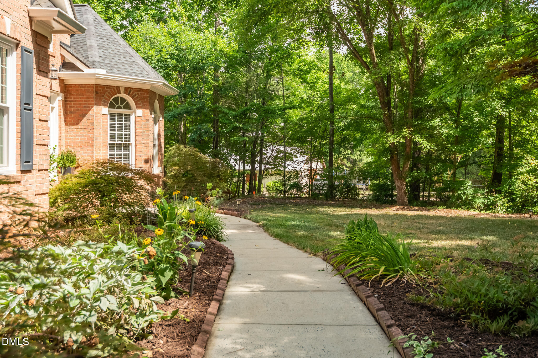 3209 Nimich Pond Way Raleigh, NC 27613 - Photo 4 of 78 front sidewalk flower beds