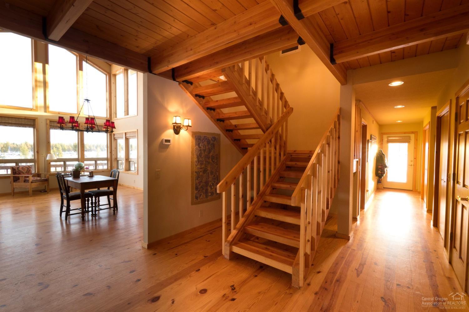 17231 Mountain View Road Sisters, OR 97759 - Photo 18 of 22 Natural pine wood floors flow into dinin