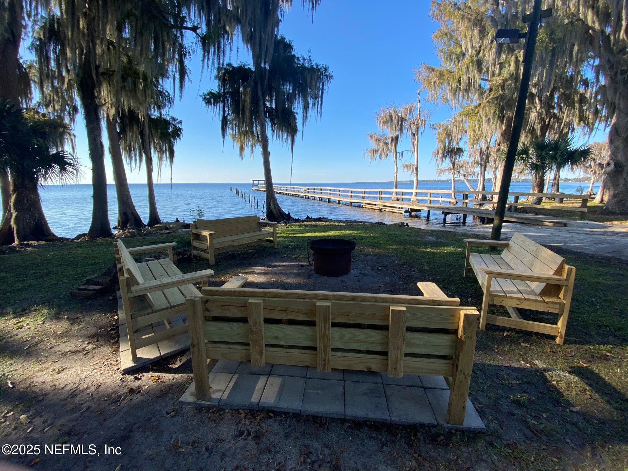 806 Paradise Boulevard Georgetown, FL 32139 - Photo 11 of 16 a view of a backyard with sitting area