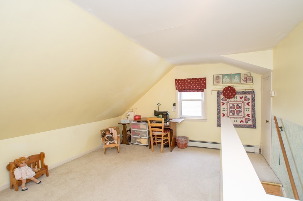 69 Lakeview Terrace Waltham, MA 02451 - Photo 13 of 17 a view of a room with furniture and air hockey table