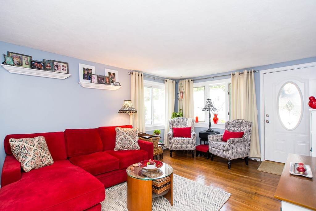 69 Lakeview Terrace Waltham, MA 02451 - Photo 2 of 17 a living room with furniture and a window