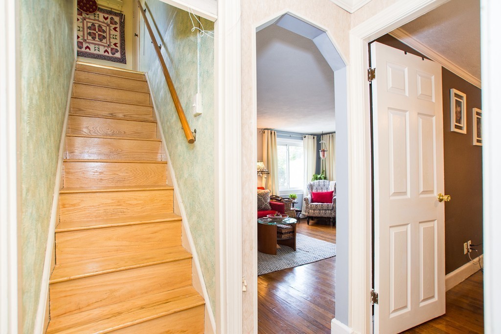 69 Lakeview Terrace Waltham, MA 02451 - Photo 10 of 17 a view of an entryway with wooden floor and a livingroom view