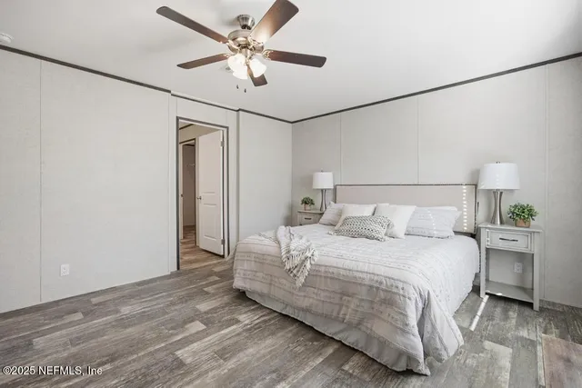 a view of a dining room with furniture and a window