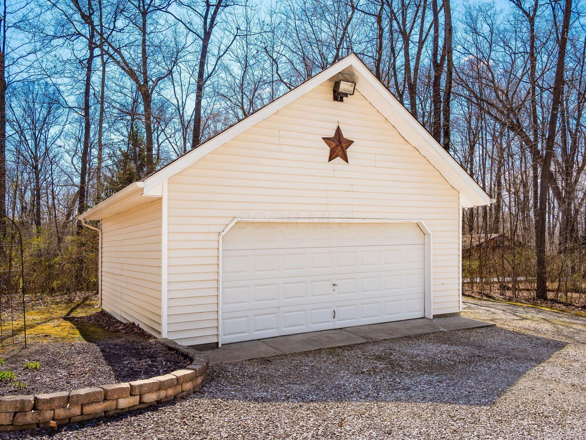 12741 Goodman Road Ashville, OH 43103 - Photo 35 of 61 A spacious two-car garage includes tons of storage space