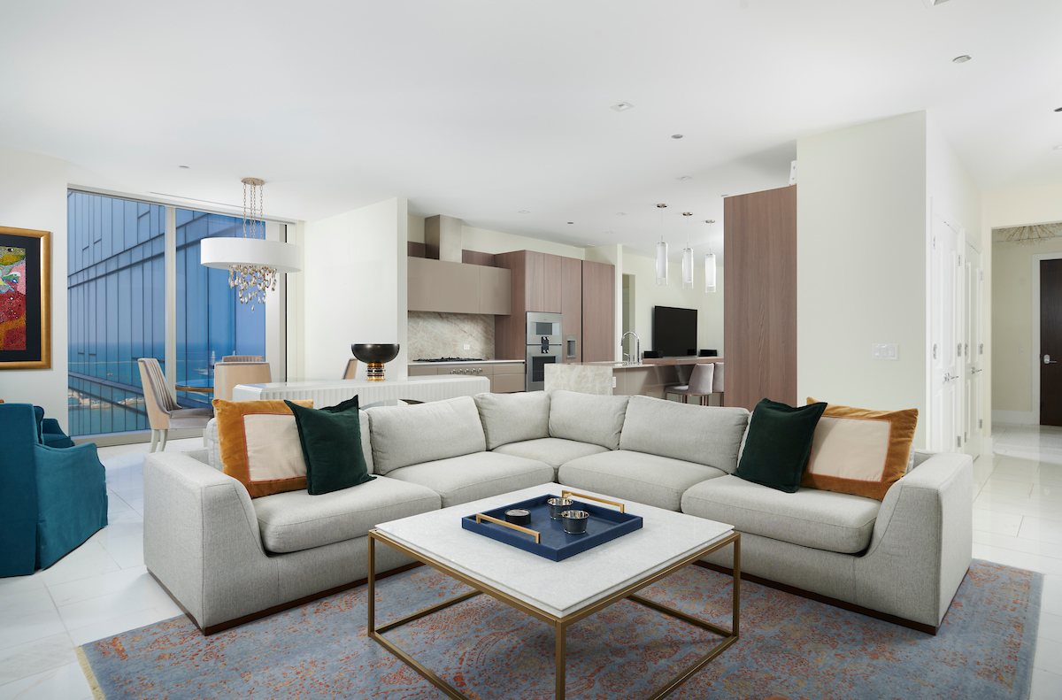 363 East Wacker Drive, Unit 1506 Chicago, IL 60601 - Photo 6 of 34 a living room with furniture and a couch