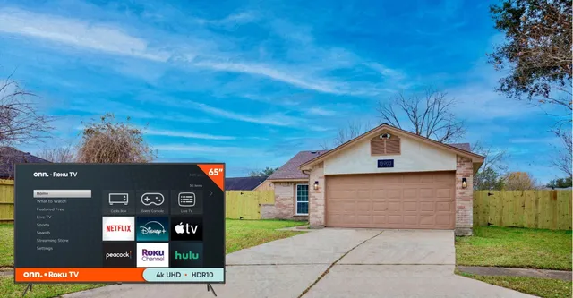 a front view of a house with garage