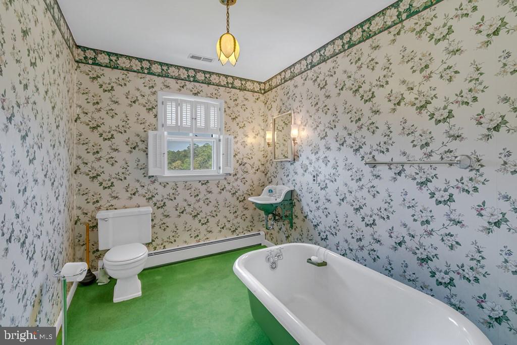 742 Main Street Reedville, VA 22539 - Photo 17 of 66 Charming vintage bathroom retreat.