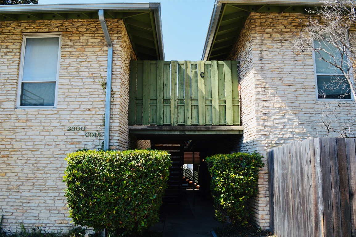 2800 Cole Street, Unit 202C Austin, TX 78705 - Photo 16 of 16 a front view of a house with a garden