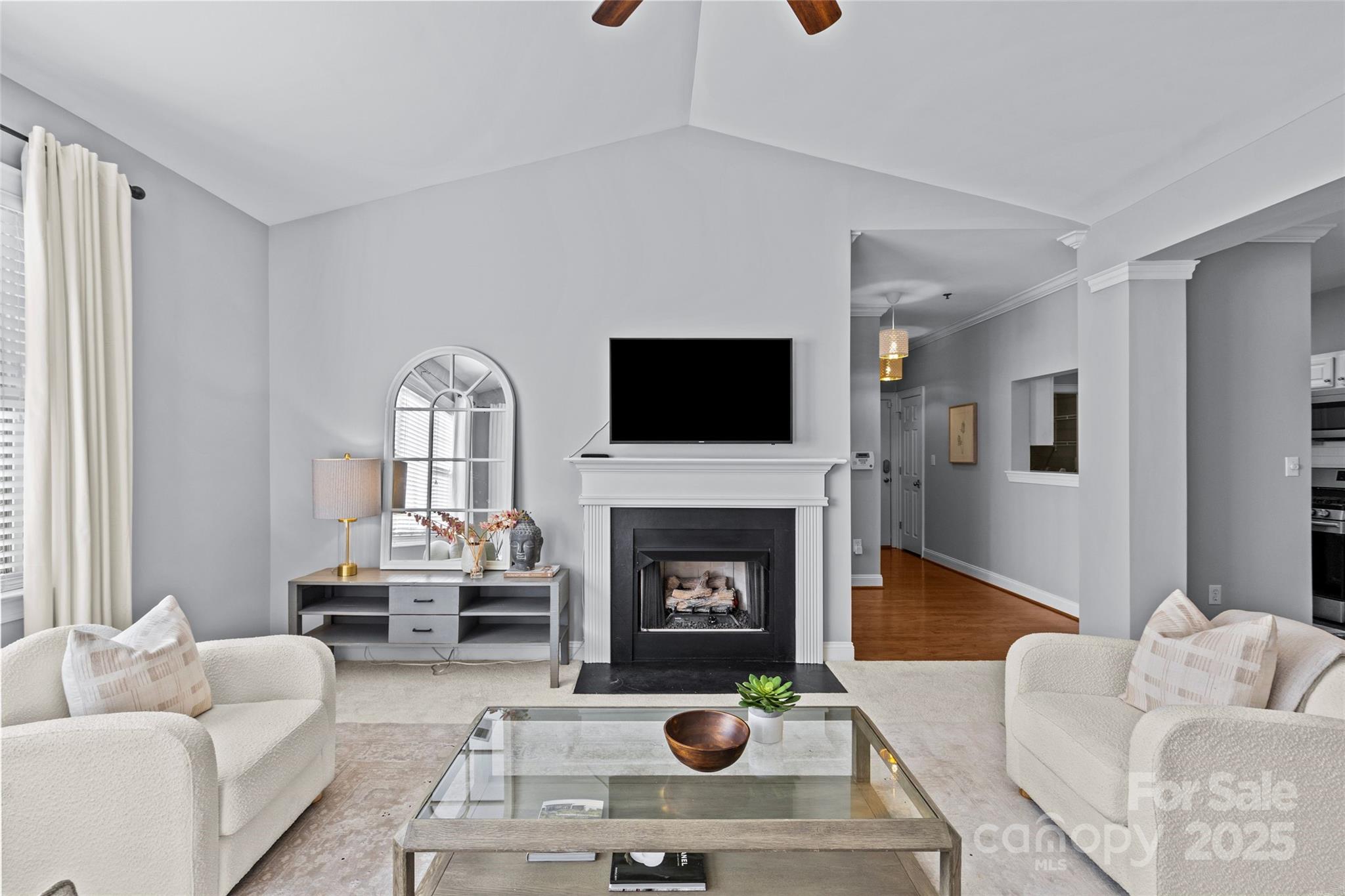 5601 Fairview Road, Unit 24 Charlotte, NC 28209 - Photo 13 of 38 a living room with furniture and a fireplace
