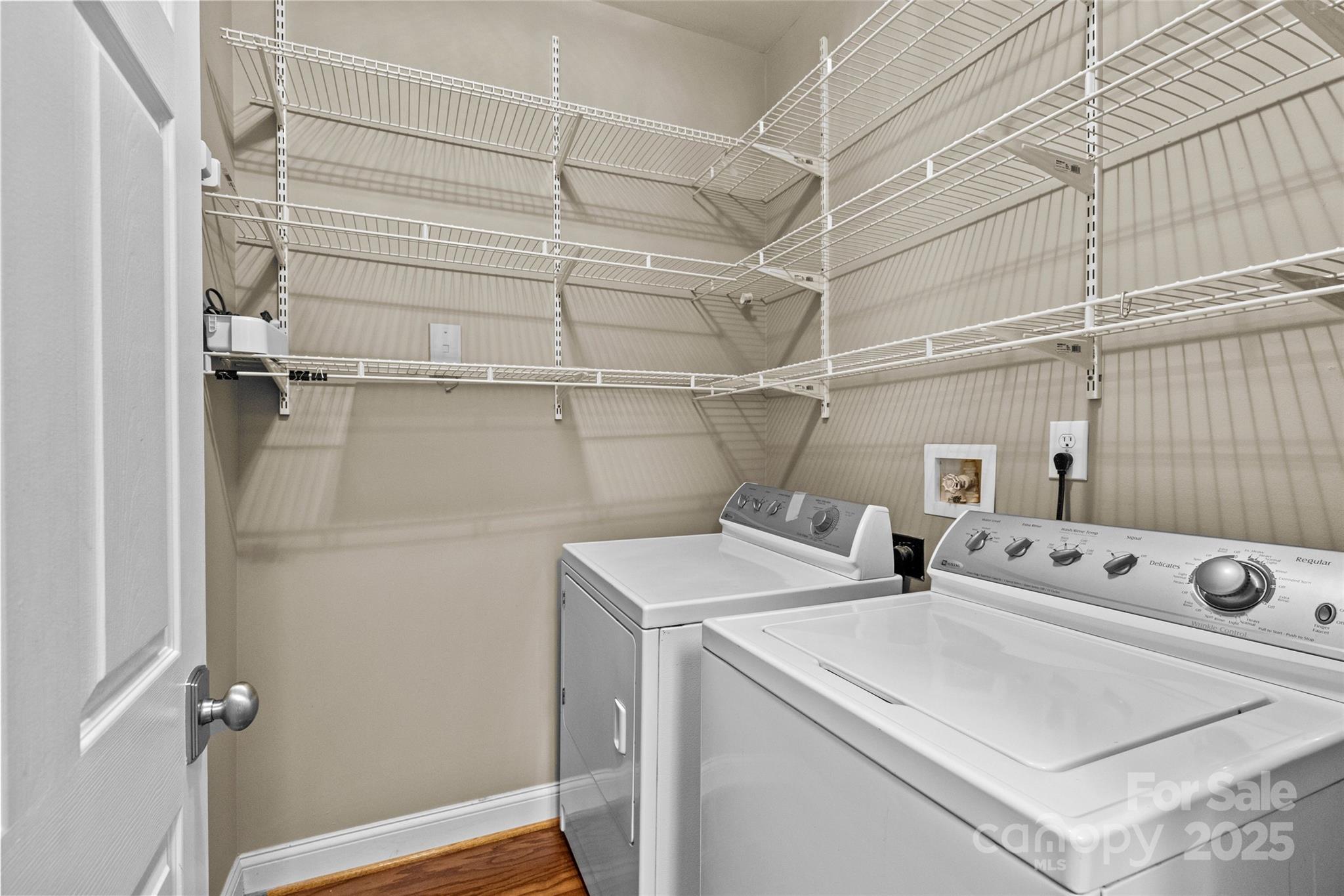 5601 Fairview Road, Unit 24 Charlotte, NC 28209 - Photo 25 of 38 a utility room with dryer and washer