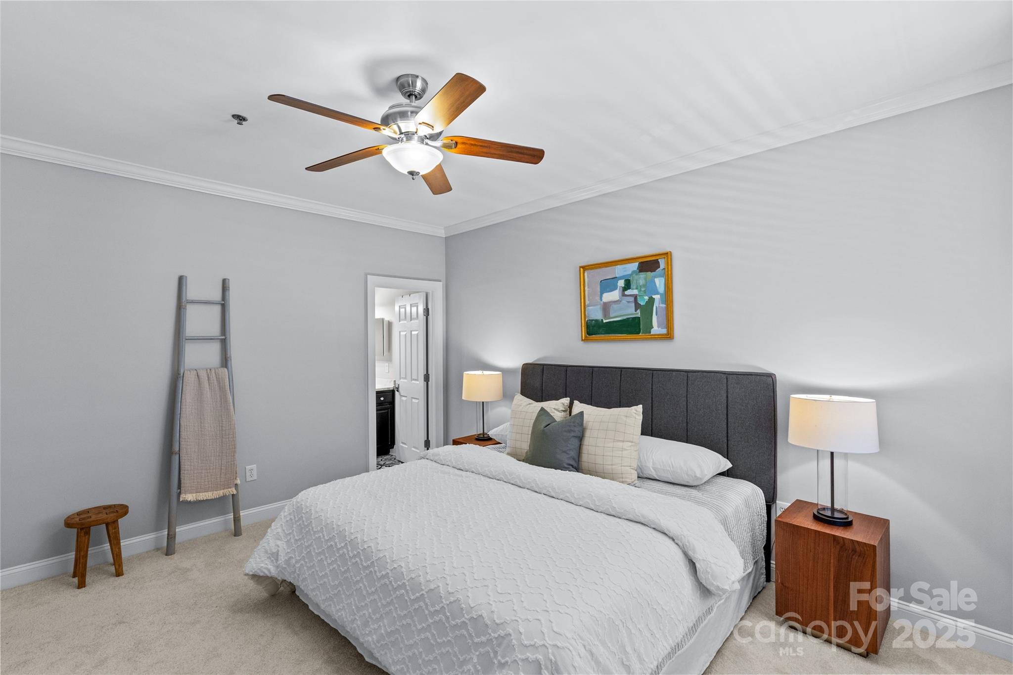 5601 Fairview Road, Unit 24 Charlotte, NC 28209 - Photo 27 of 38 a bedroom with a bed and a lamp