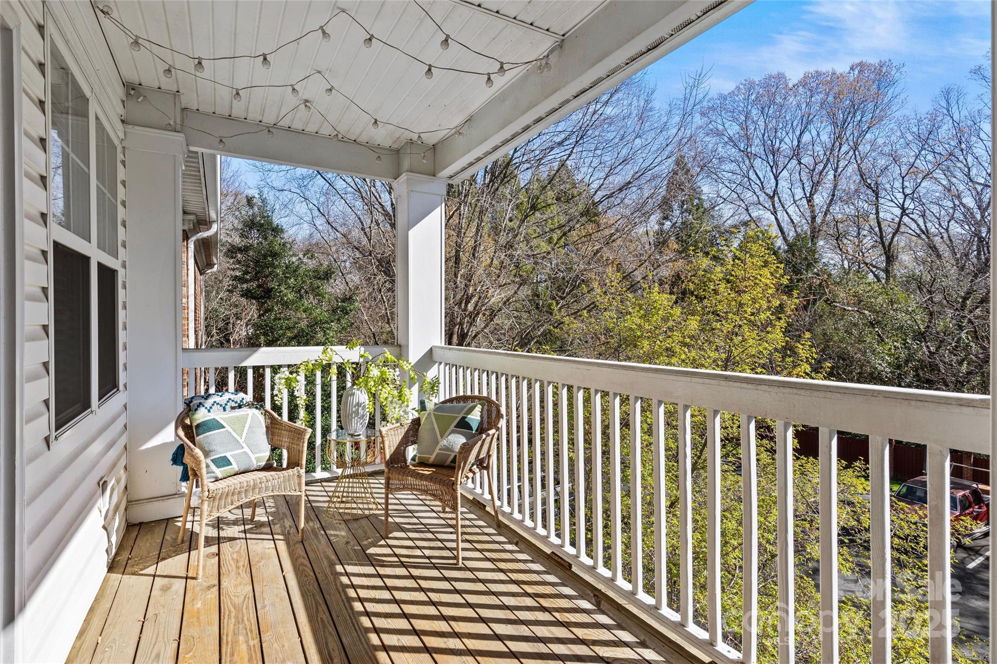 5601 Fairview Road, Unit 24 Charlotte, NC 28209 - Photo 33 of 38 a view of balcony with wooden floor