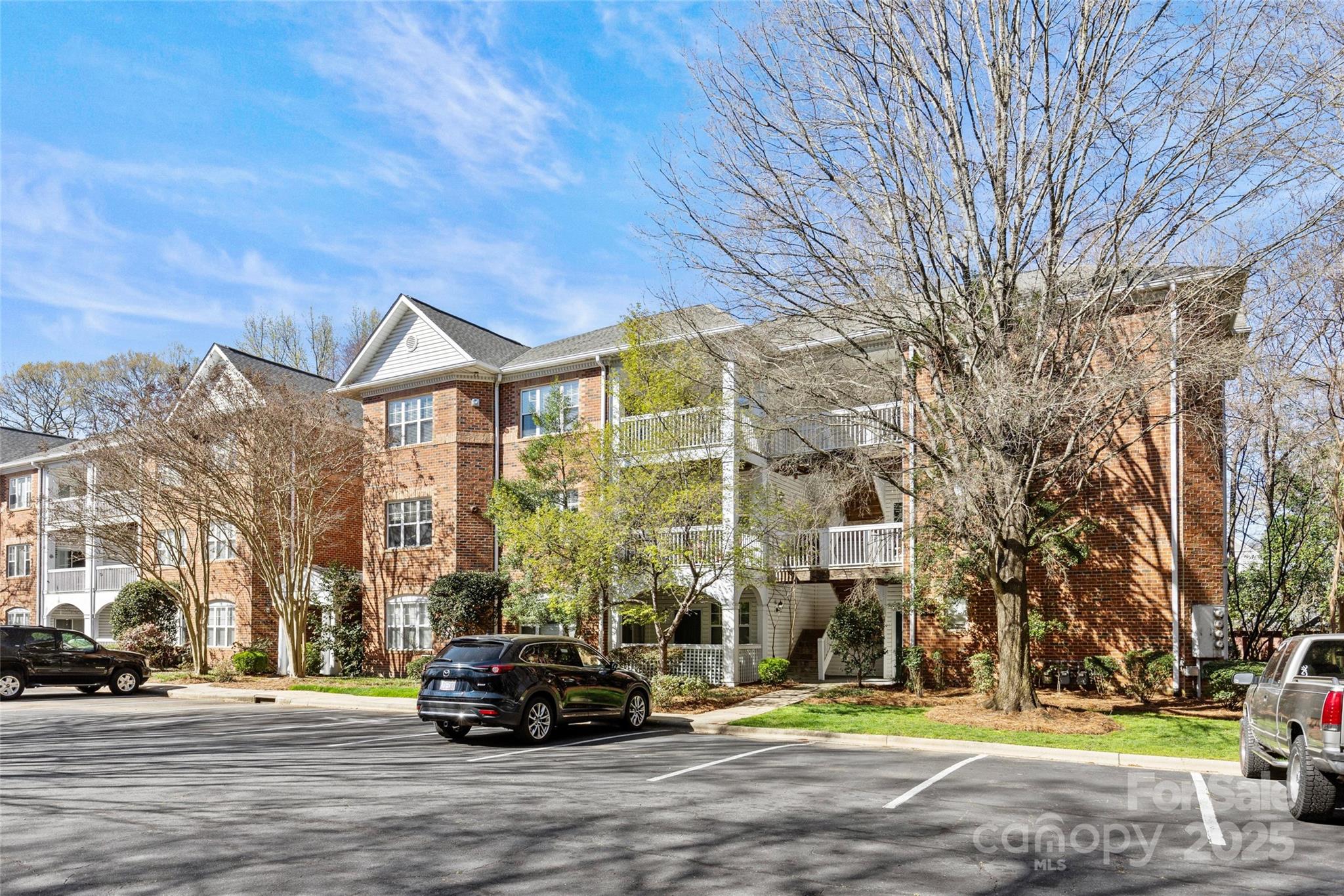 5601 Fairview Road, Unit 24 Charlotte, NC 28209 - Photo 35 of 38 a front view of a building with garden